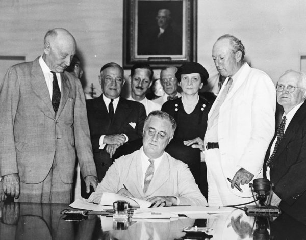 Image: Photo of President Roosevelt Signing the 1935 Social Security Act. From the Wikimedia Commons.