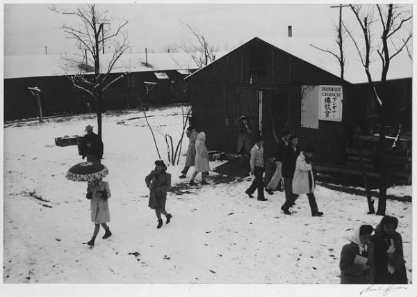 Image: Photo of people leaving Buddhist church in Manzanar Relocation Center taken by Ansel Adams in 1943. From the Library of Congress.