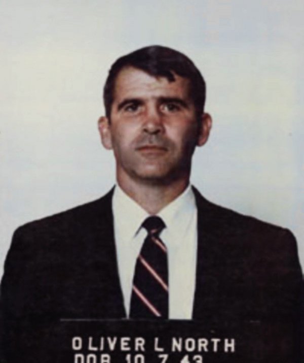 Image: Police photograph of Oliver North in 1988. From the Wikimedia Commons.