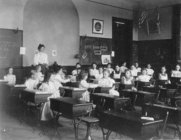 Image: Photo of young students in a classroom by Frances Benjamin Johnston, 1899. From the Library of Congress.