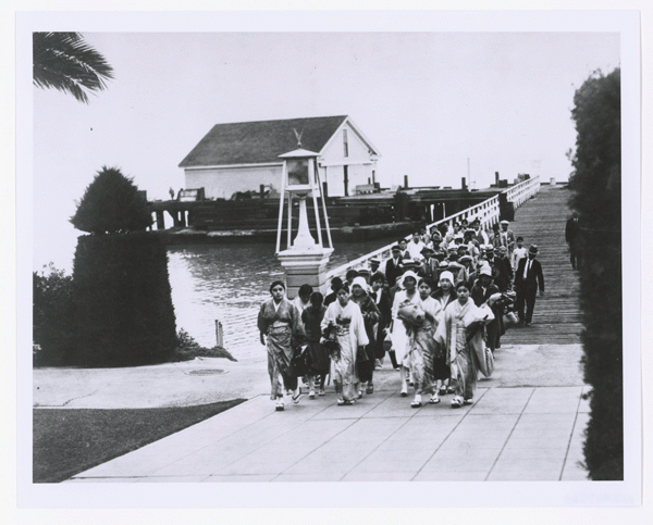 Photograph of immigrants arriving at the Angel Island Immigration Station