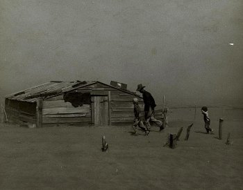 Image: Photo of Oklahoma farmer and sons walking in the face of a dust storm taken in 1936 by Arthur Rothstein. From the Library of Congress.