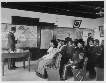 Photo of African American and Native American students in Ancient History class by Frances Benjamin Johnston, 1899.