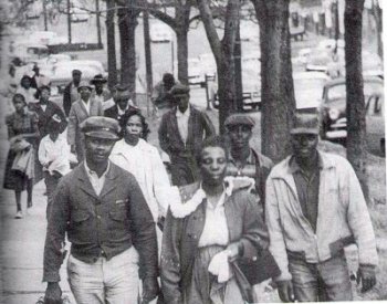 Image: Photo of Black residents walking during the Montgomery Bus Boycott in 1955. From BlackPast.org.