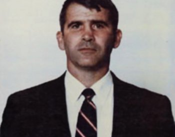 Image: Police photograph of Oliver North in 1988. From the Wikimedia Commons.