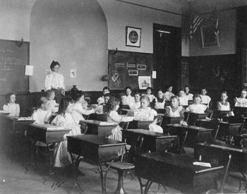 Image: Photo of young students in a classroom by Frances Benjamin Johnston, 1899. From the Library of Congress.